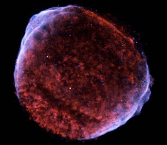 False color X-ray image taken by the Chandra observatory of the SN1006 supernova remnant.