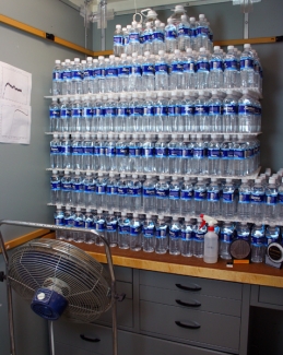 Photograph of several hundred half-liter water bottles.