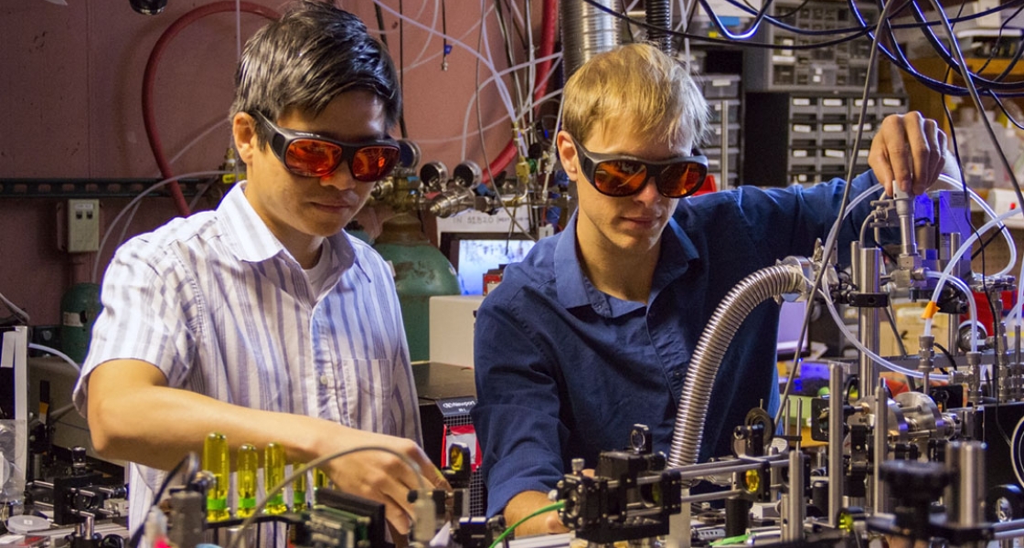 Thinh Bui (l) and Bryce Bjork (r) in the lab.