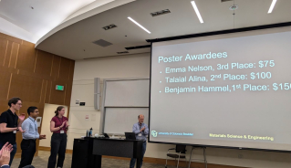 JILA graduate student Emma Nelson (left) claps as the award winners are announced at the CU Boulder Innovation in Materials Symposium 2024