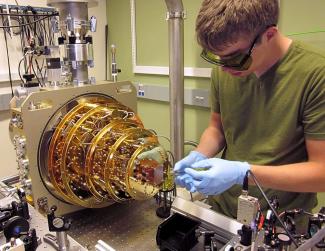 Photo of lab equipment that cools a tiny quantum drum.