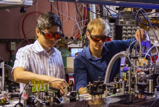 Thinh Bui (l) and Bryce Bjork (r) in the lab.