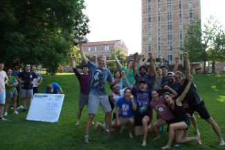 JILA and NIST Fellow and University of Colorado Boulder physics professor Konrad Lehnert celebrates with his research group their win of the JILA cup