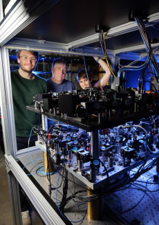 From left to right, Kendall Mehling, Murray Holland and Catie LeDesma in their lab at CU Boulder