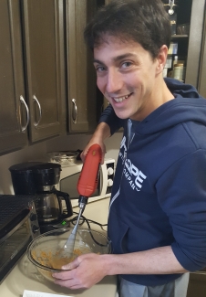 picture of James with a whisk chucked up in a drill