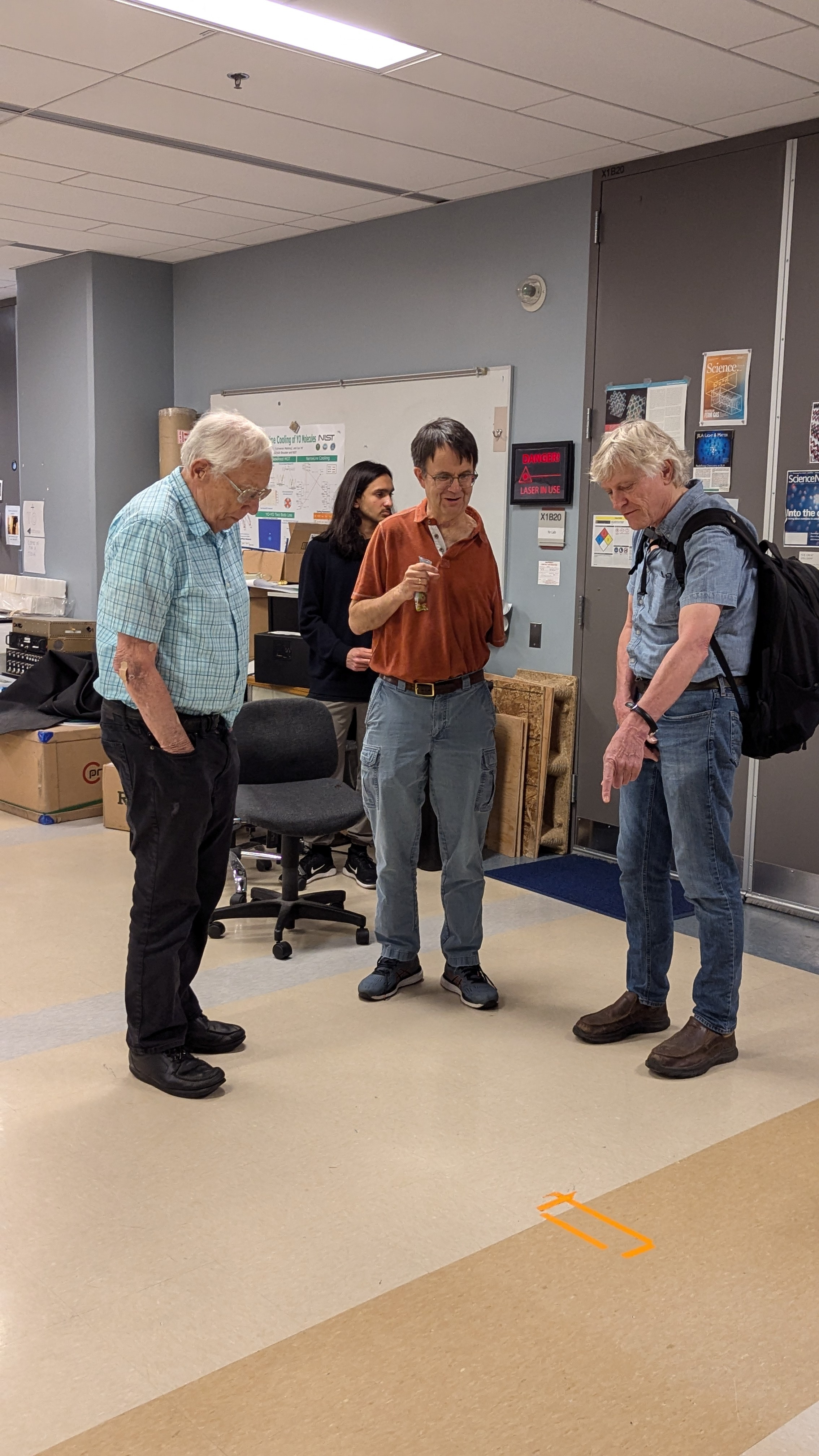 (L to R): JILA and NIST Fellow Judah Levine talks with JILA and NIST Fellow and CU Boulder Physics professor Eric Cornell and JILA Fellow and Astrophysical and Planetary Sciences Professor Andrew Hamilton about the summer solstice