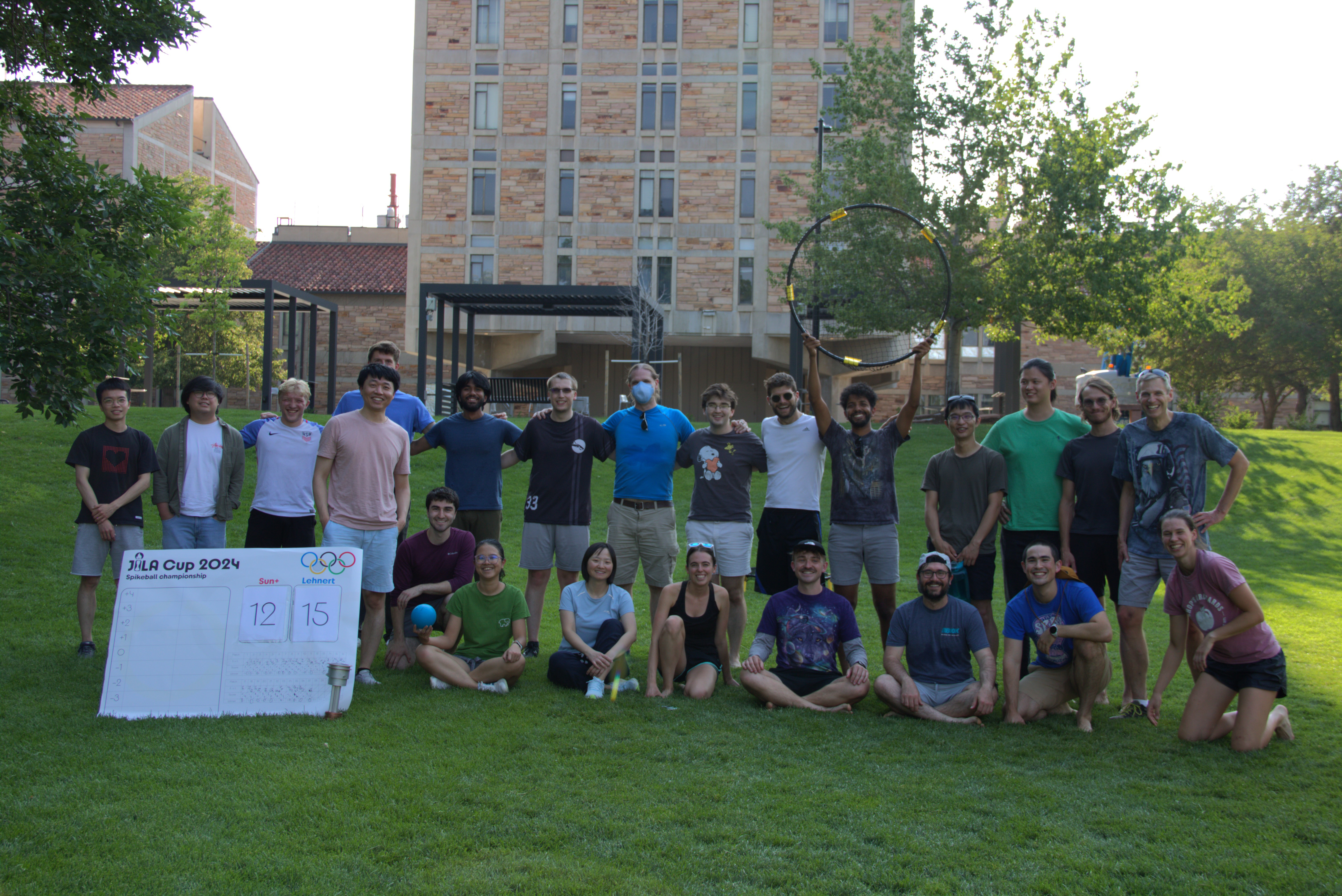 The Lehnert and Sun groups pose for a photo celebrating sportsmanship and community