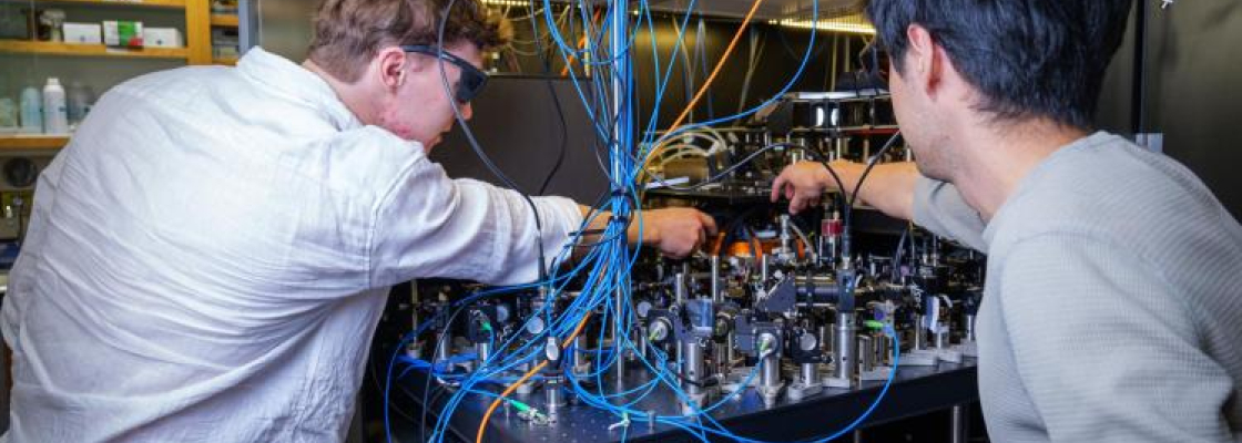 JILA researchers Lukin Yelin and Cao in the Kaufman lab at JILA. (Credit: Patrick Campbell/CU Boulder)