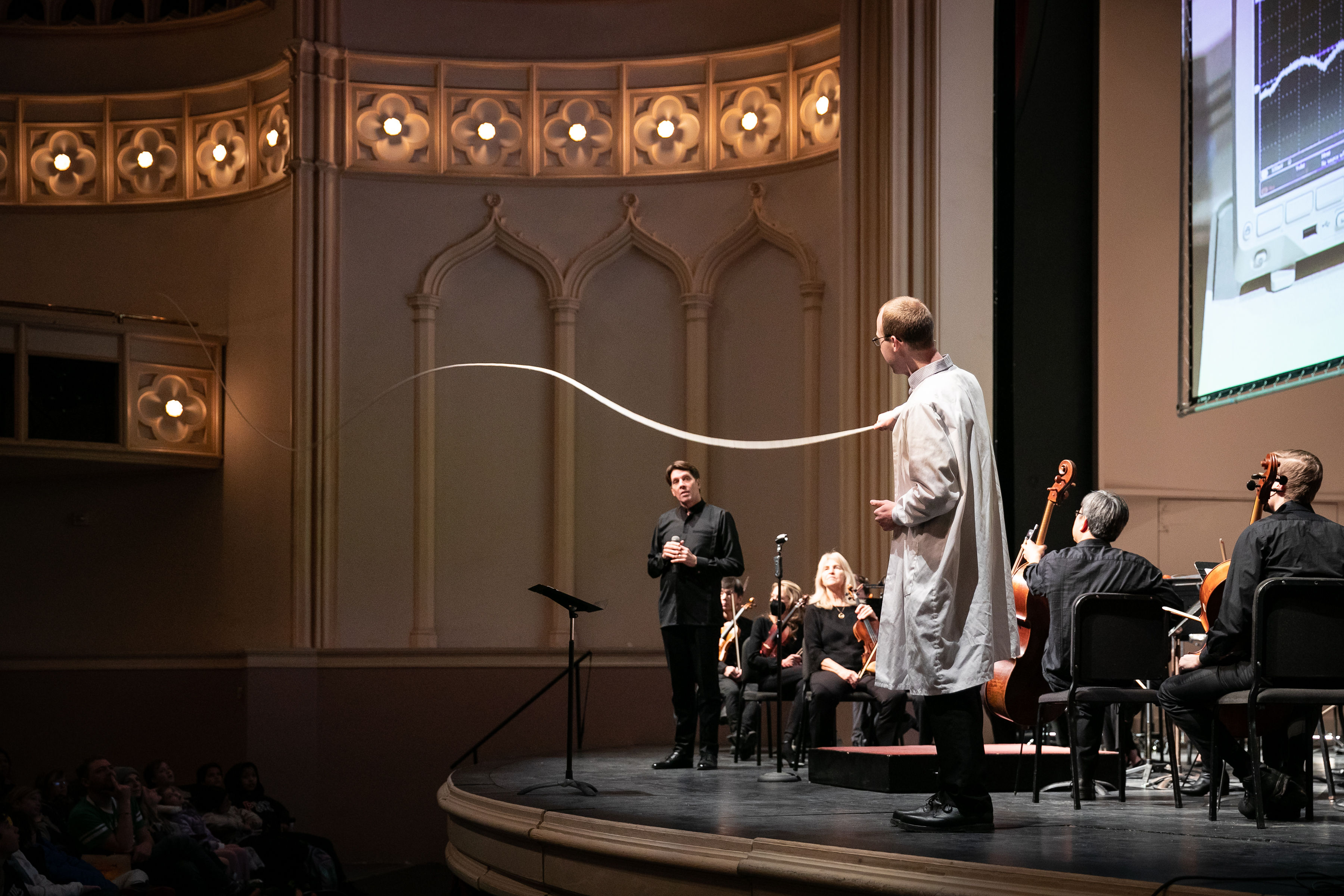 Demonstrating standing waves for a group of middle school students at an orchestra concert.